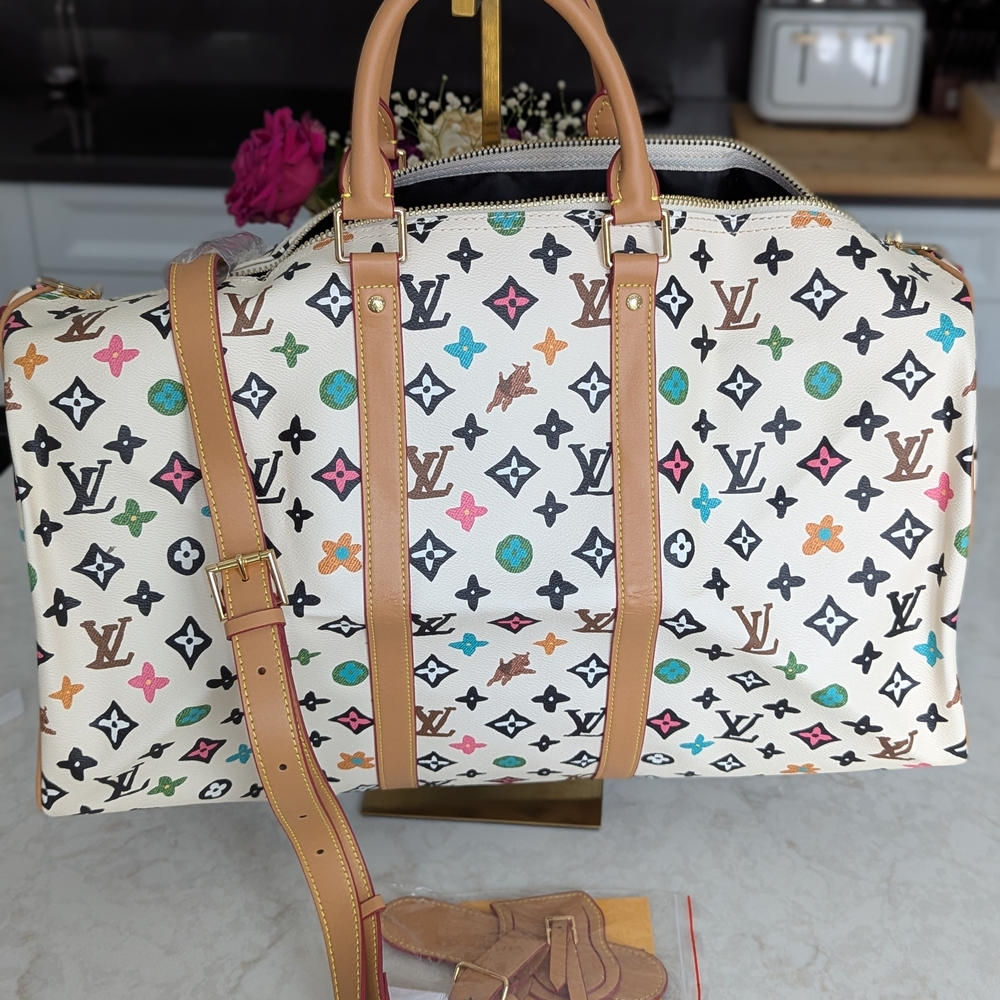Multicolor Monogram Keepall Bandoulière on White Canvas